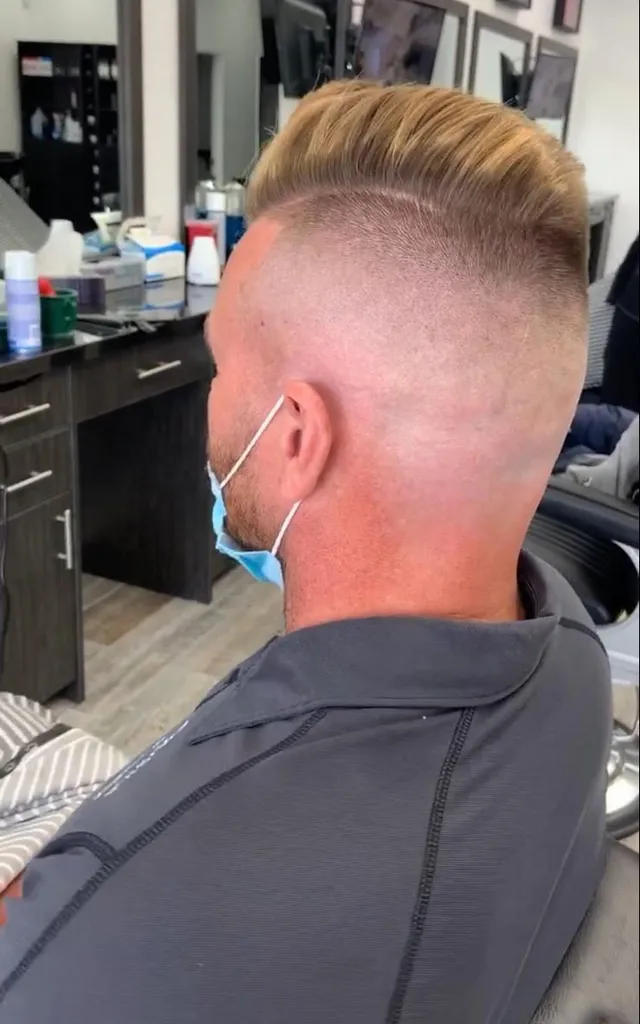 Fresh fade haircut finished at Taurus Barbershop