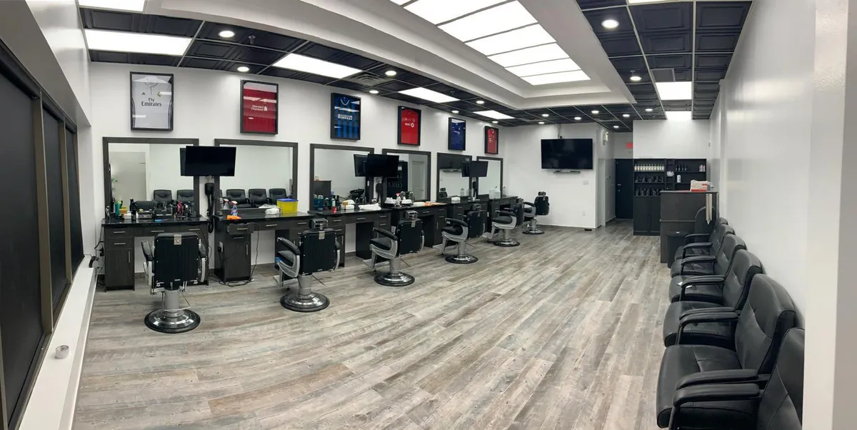 Taurus Barbershop interior — barber chairs, mirrors and styling stations